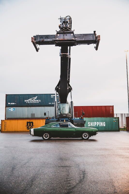 shipping a green car - crane